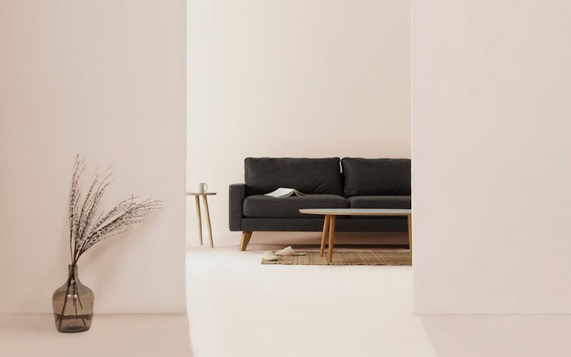 black and brown leather padded tub sofa