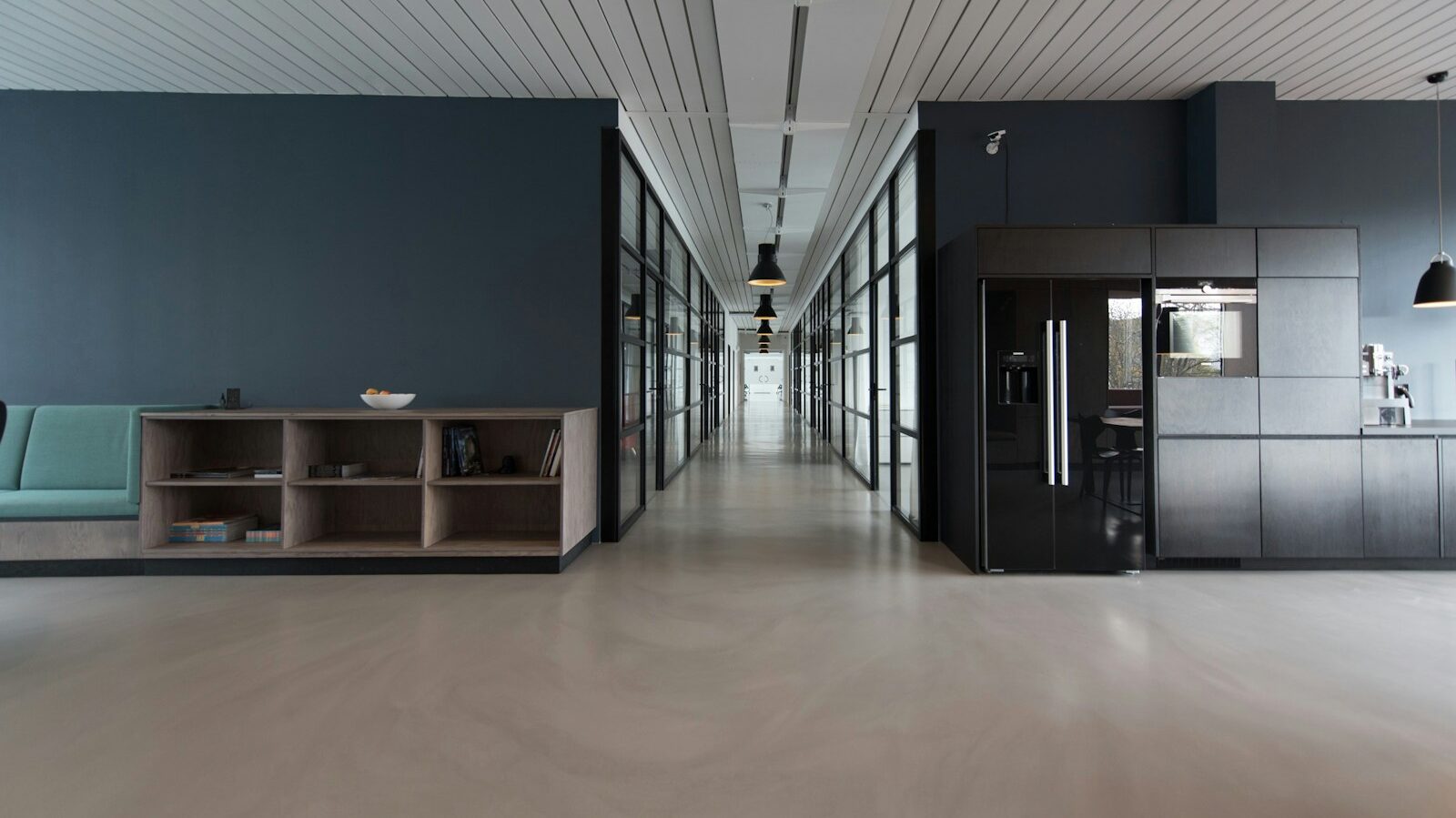 architectural photography of black and brown hallway